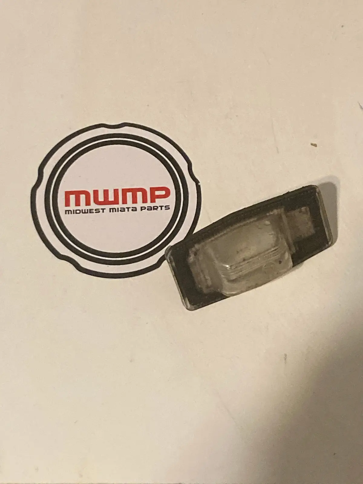 1999-2005 Mazda Miata License Lamp Housing 1