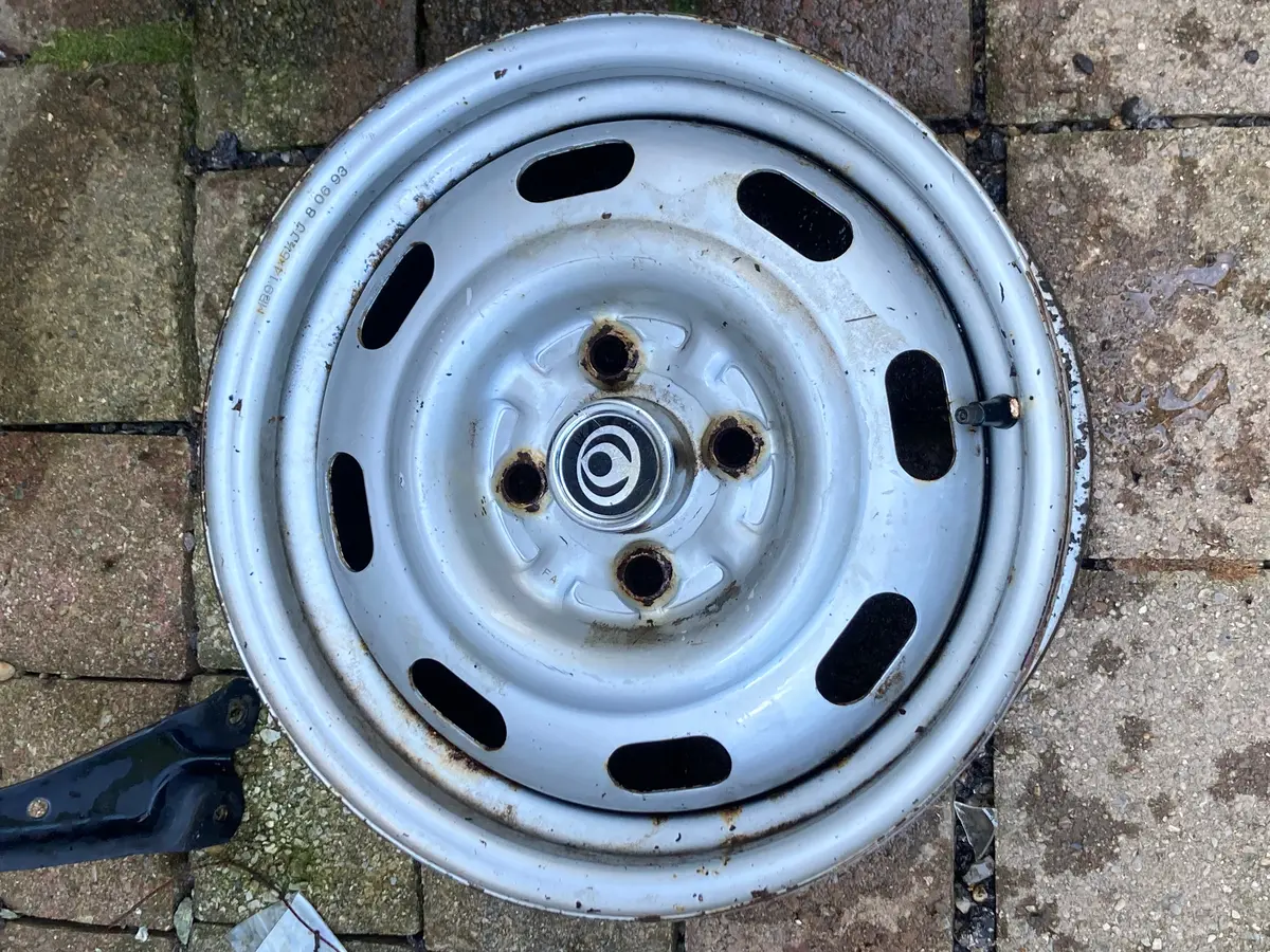 1993-1994 Mazda Miata 15X6 4X100 Steel Wheel With Mazda Center Cap 1